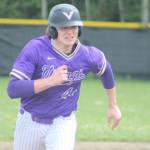 Luke Caputo/Kitsap News Group photos
Viking Dawsyn Anderson heads for third base during a 7-6 NK win over Buccaneers April 23 in Kingston.