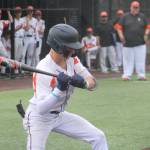 Luke Caputo/Kitsap News Group photos
Cougar Brayden Flaugher takes a pitch during a 10-1 CK home loss to the White River Hornets May 12 in the first round of the 2026 District 3 3A Baseball Tournament.