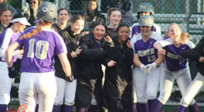 Luke Caputo/Kitsap News Group photos
The North Kitsap Vikings cheer on Rachel Shigley as she approaches home plate after her third home run of the game in a 10-8 loss to Port Angeles in the 2026 District 3 2A Fastpitch Championship May 16 at the Regional Athletic Complex in Lacey.
