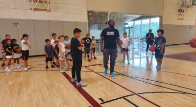 Jimmy King courtesy photo
New Kingston High School girls basketball coach Jimmy King trains young athletes at the Suquamish Fitness Center.