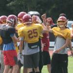 Luke Caputo/Kitsap News Group photos
The Kingston Buccaneers football team huddles up during a practice session July 28.